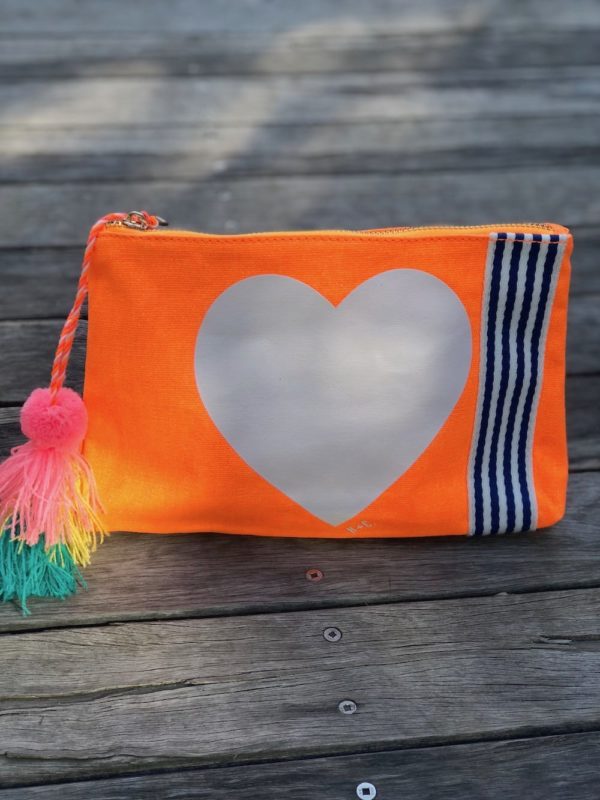 hammill and co canvas clutch in bright orange with bright white star on front online at mary and me