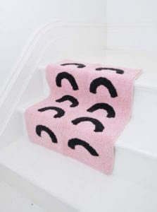 mosey me bath mat with pink backing and black curve arc through out online at Mary and Me