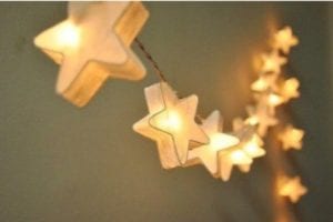 LED white star garland lights hanging online at mary and me