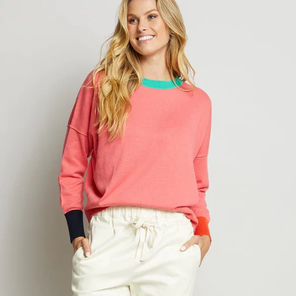 close up of coral knit with round neck