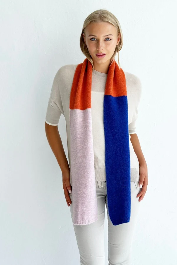 thin multi coloured scarf in rust, light pink and royal blue